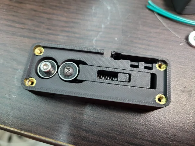 Filament width sensor (hall sensors) by mcmatrix modified to use a nut and heat inserts