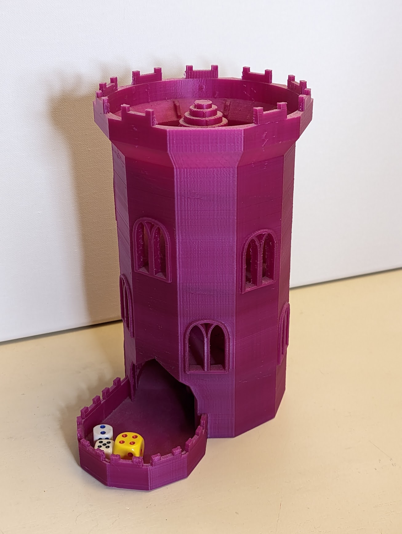 Dice tower with internal spiral stairway