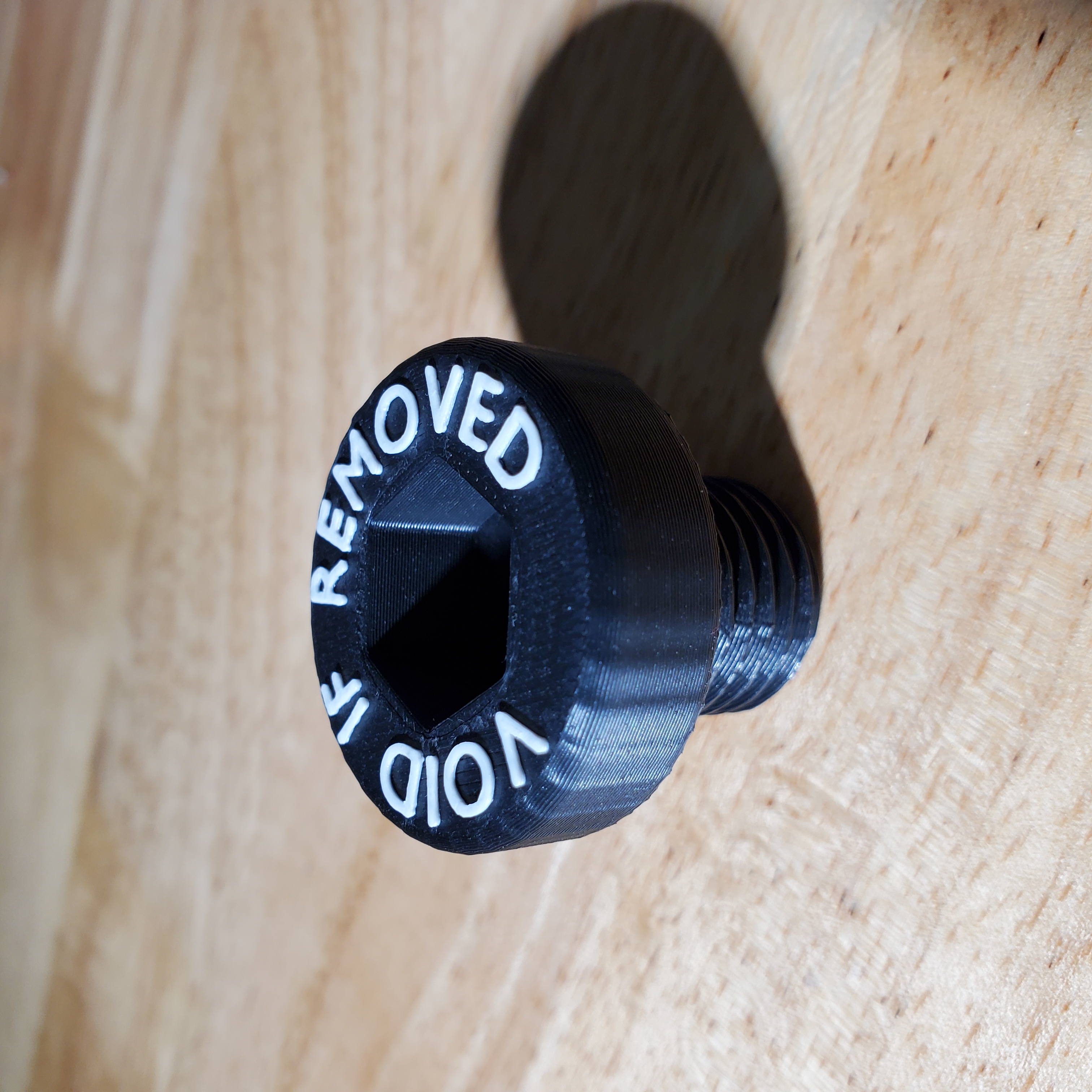 Warranty Voided if Removed Screw