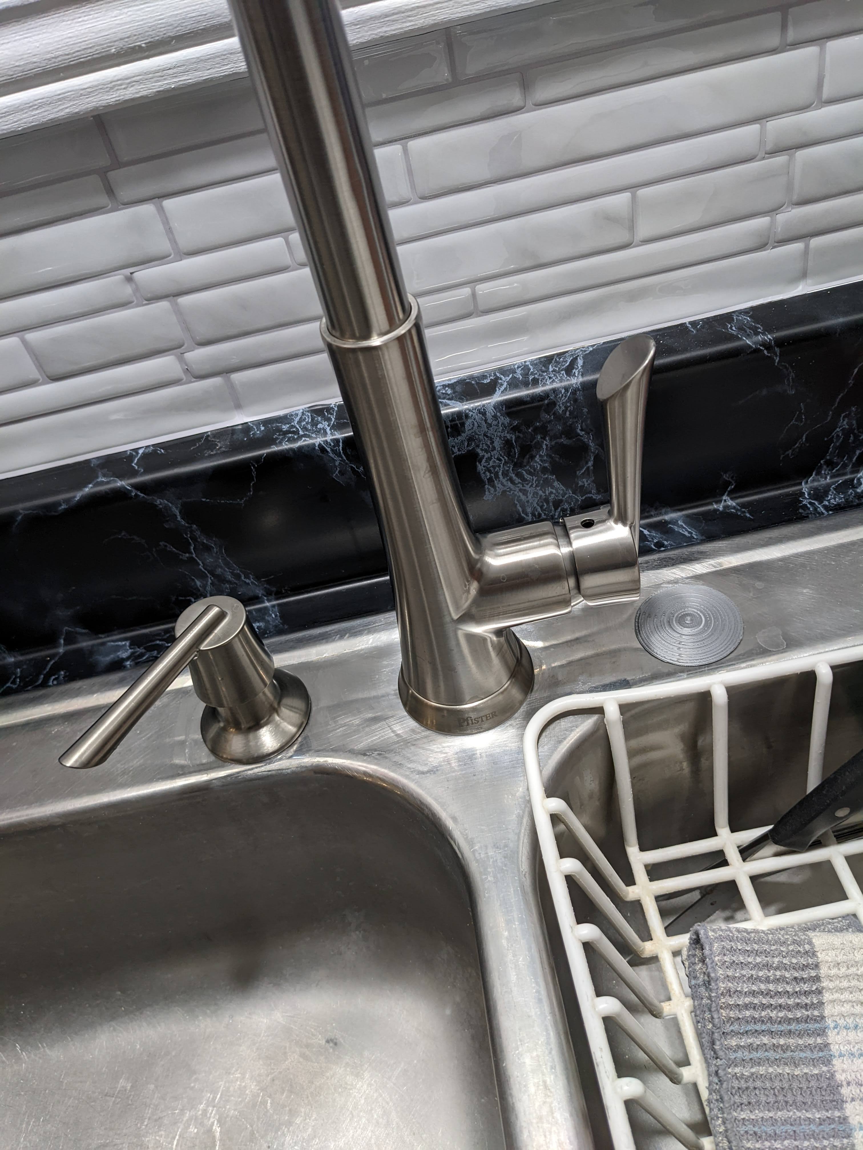 Kitchen sink hole plug