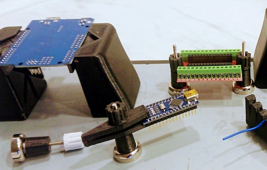Magnetic PCB solder fixture for steel work plate