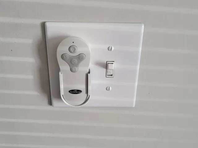 Light Switch with harbor breeze remote holder