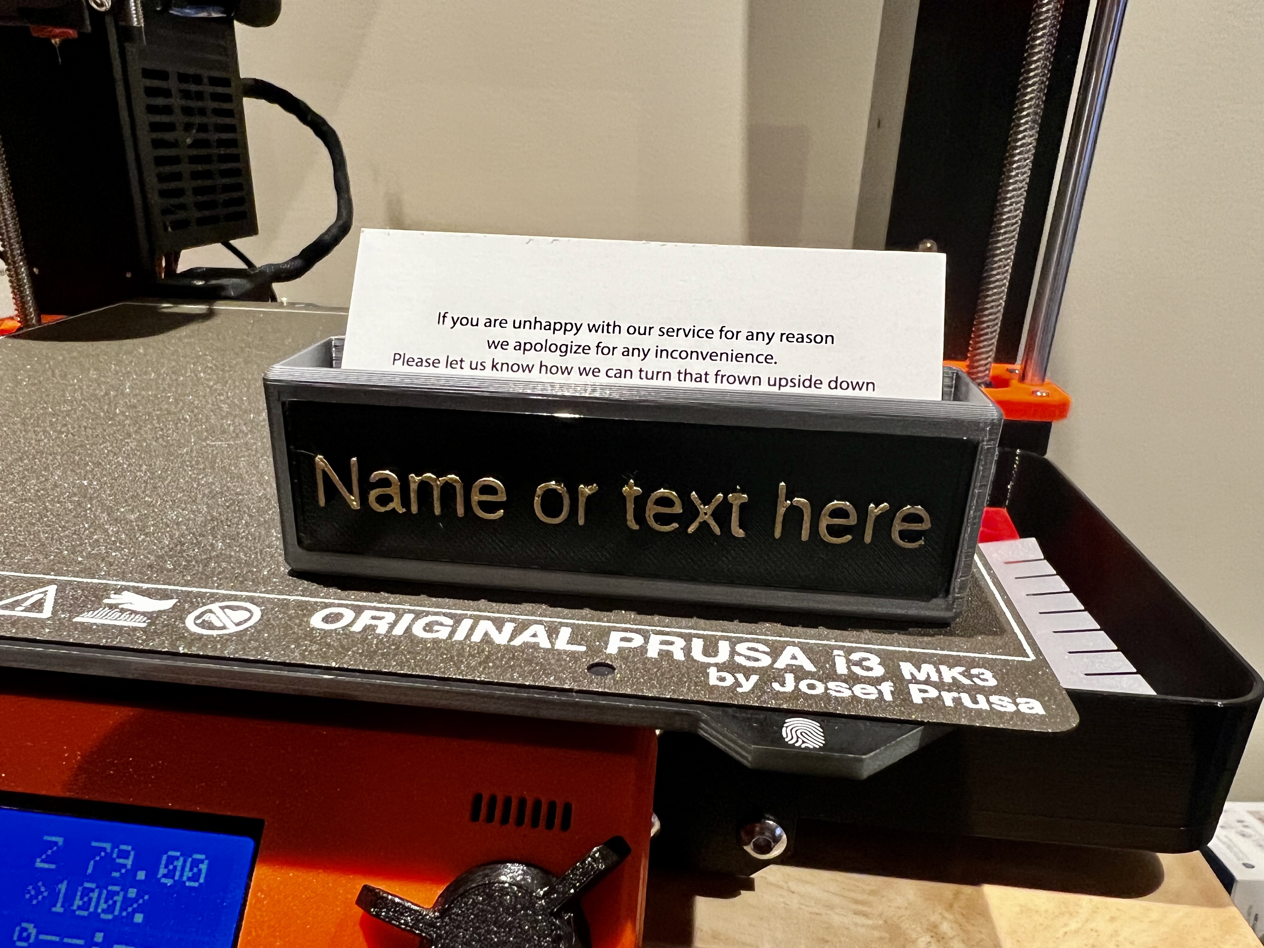 Business card holder with nameplate (OpenSCAD)