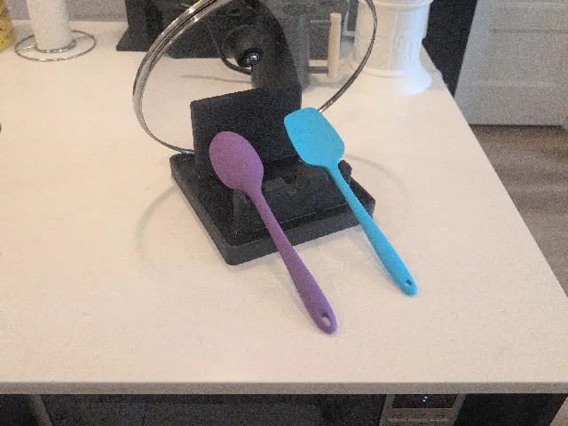 Pot lid and utensil holder