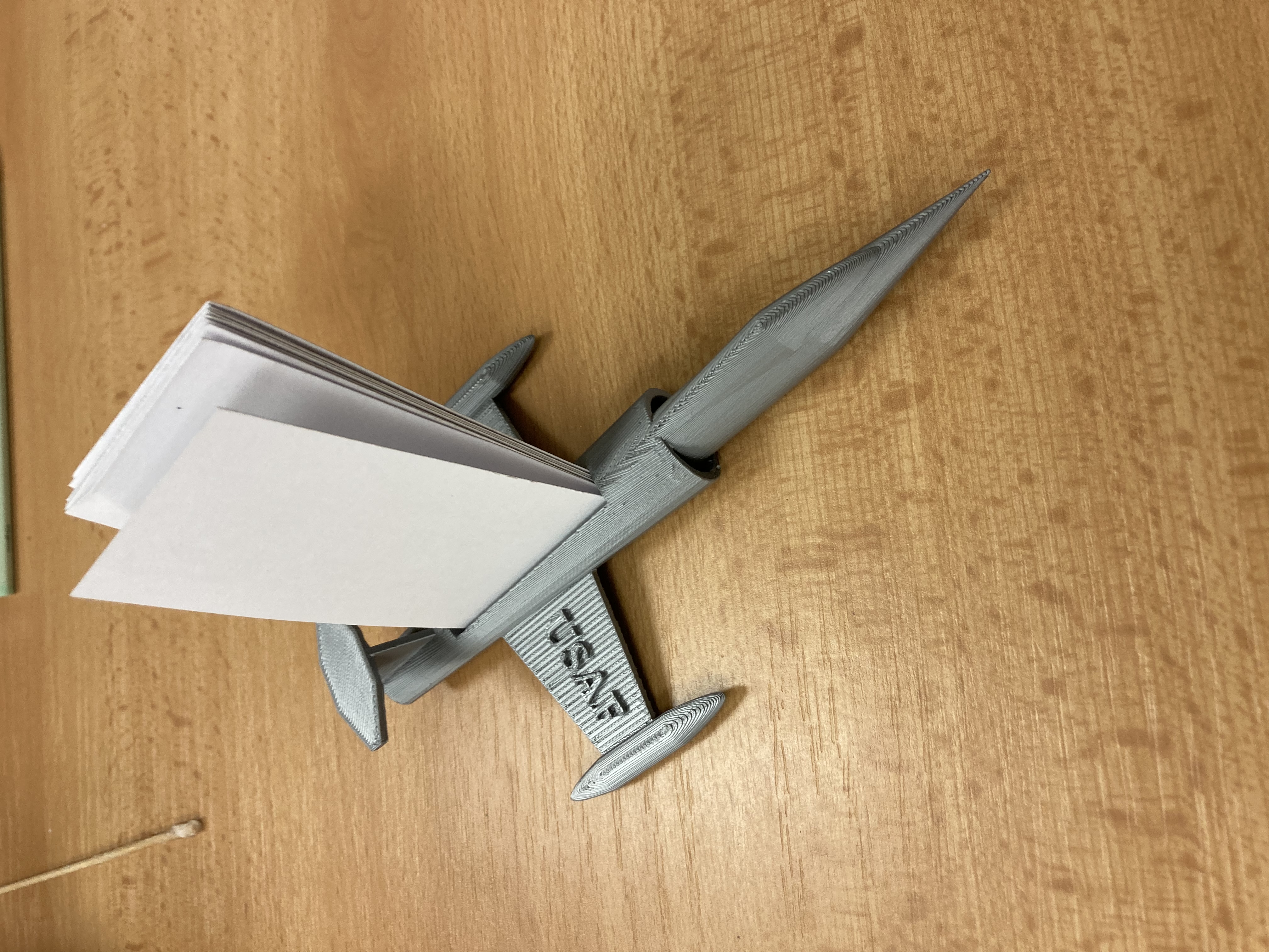 Plane business card stand