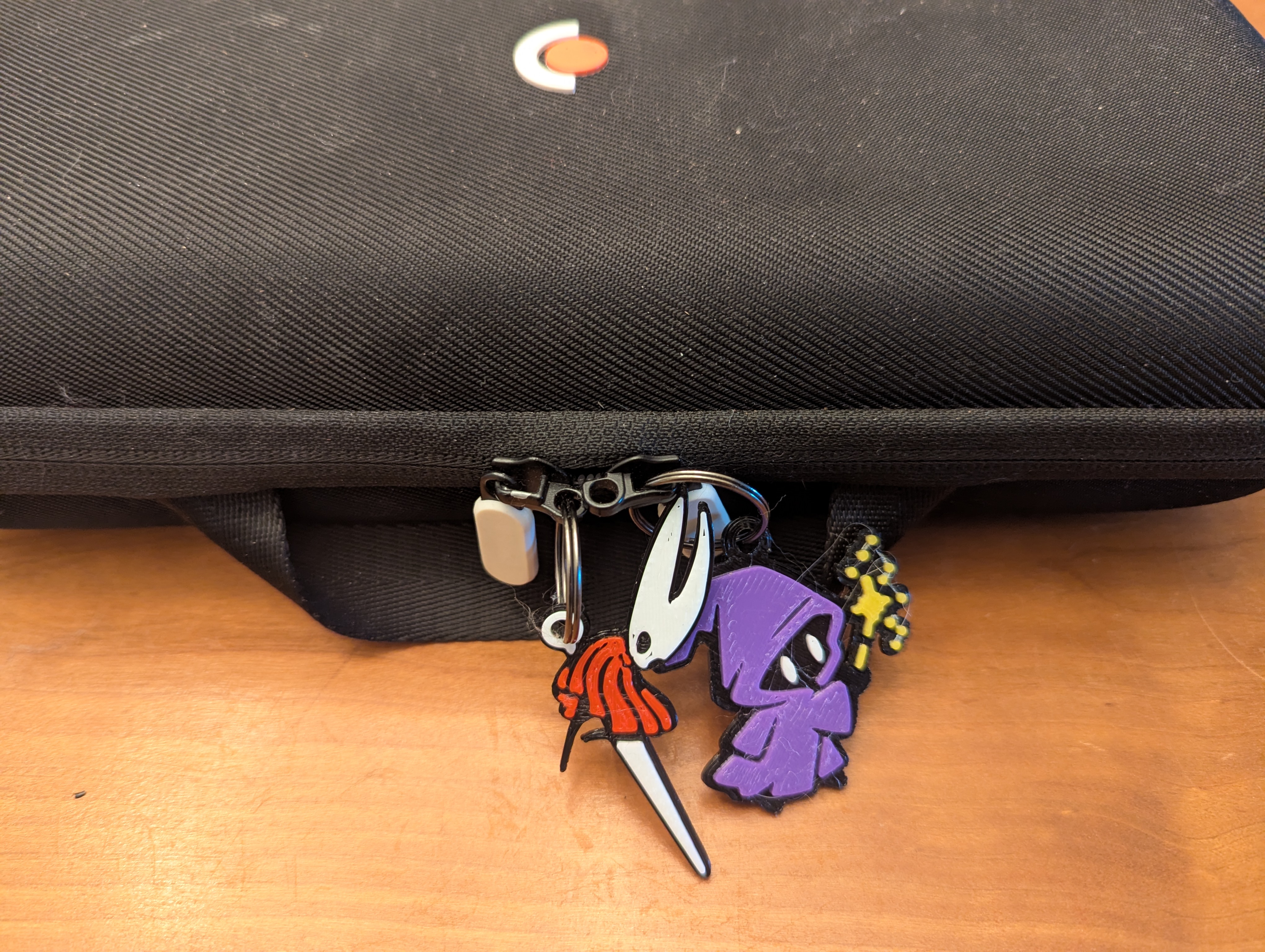 Silksong Hornet keychain, zipper pull, or bag tag