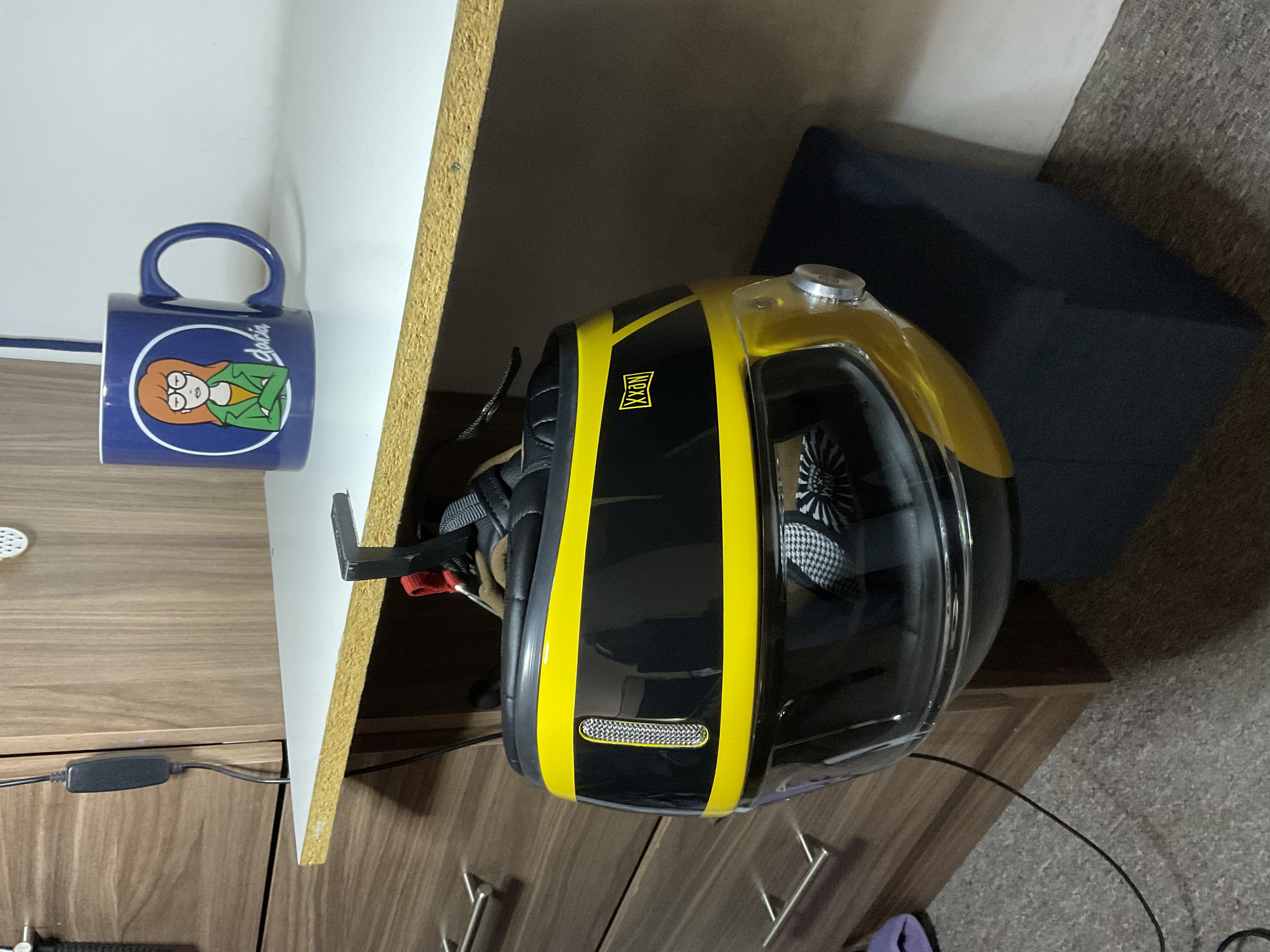 helmet holder for tables