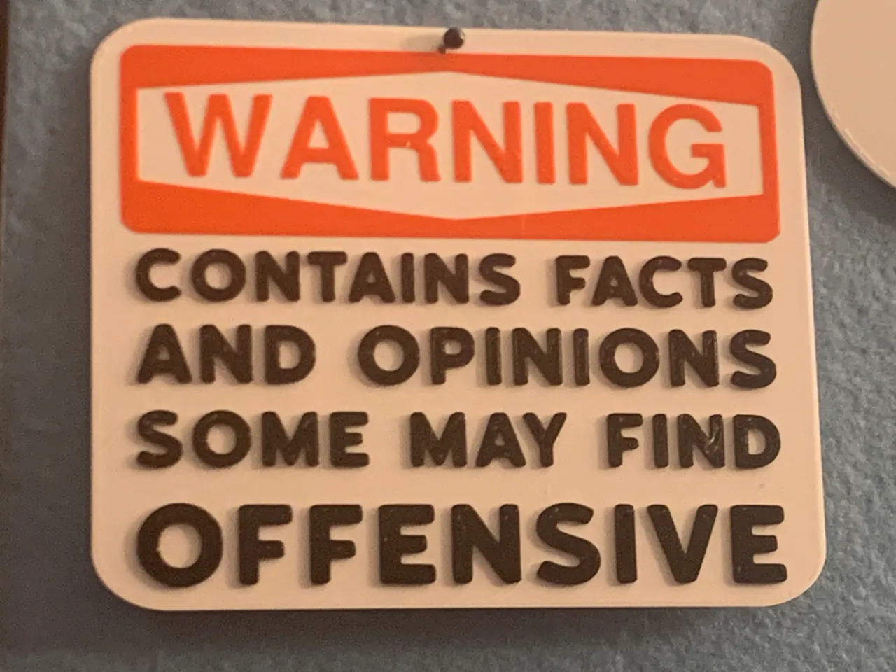 Warning Sign : Contains Facts and Opinions Some May Find Offensive