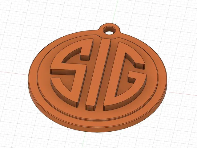 Sig Saur logo round key chain with raised letters