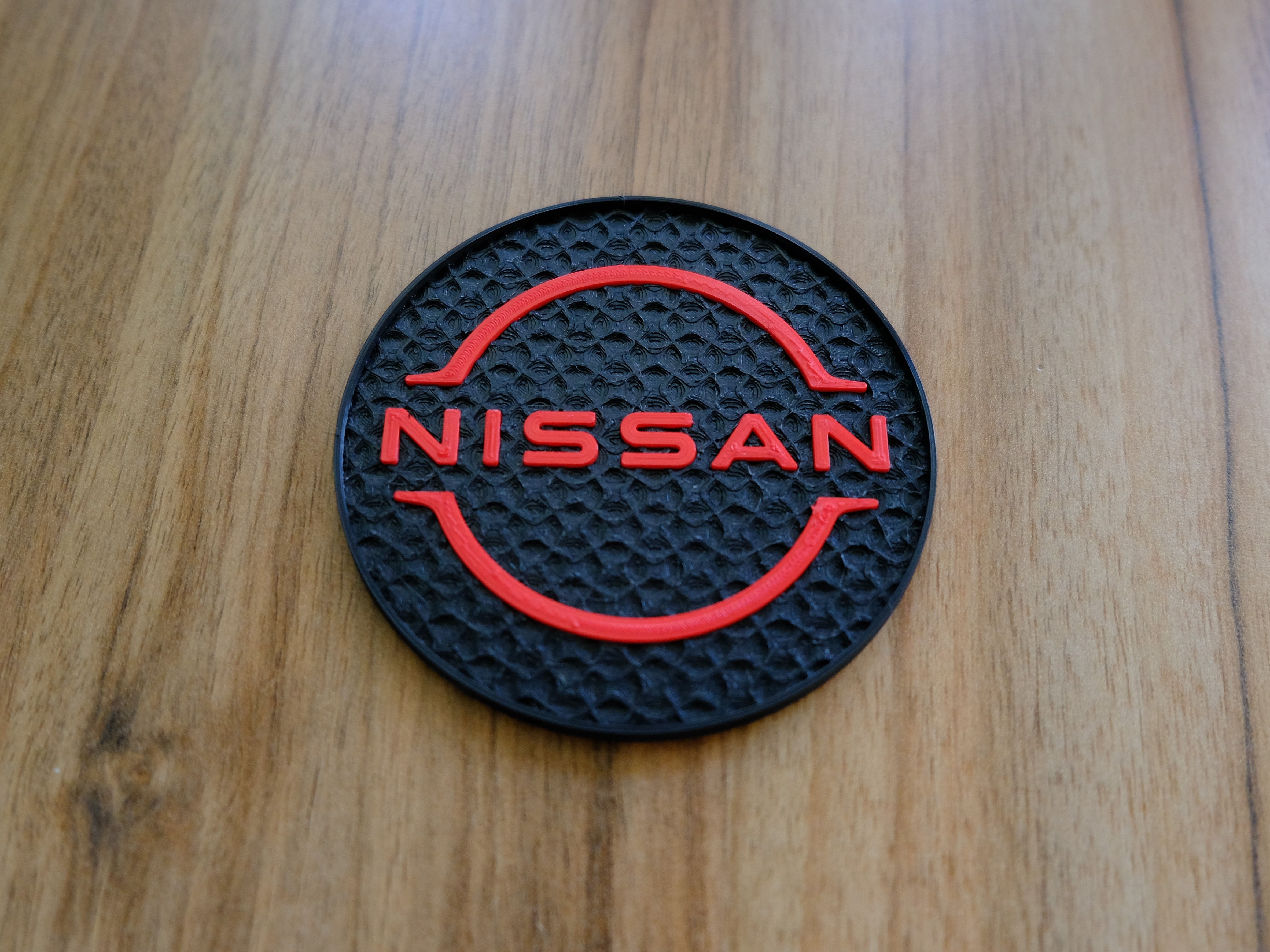 Nissan logo coaster