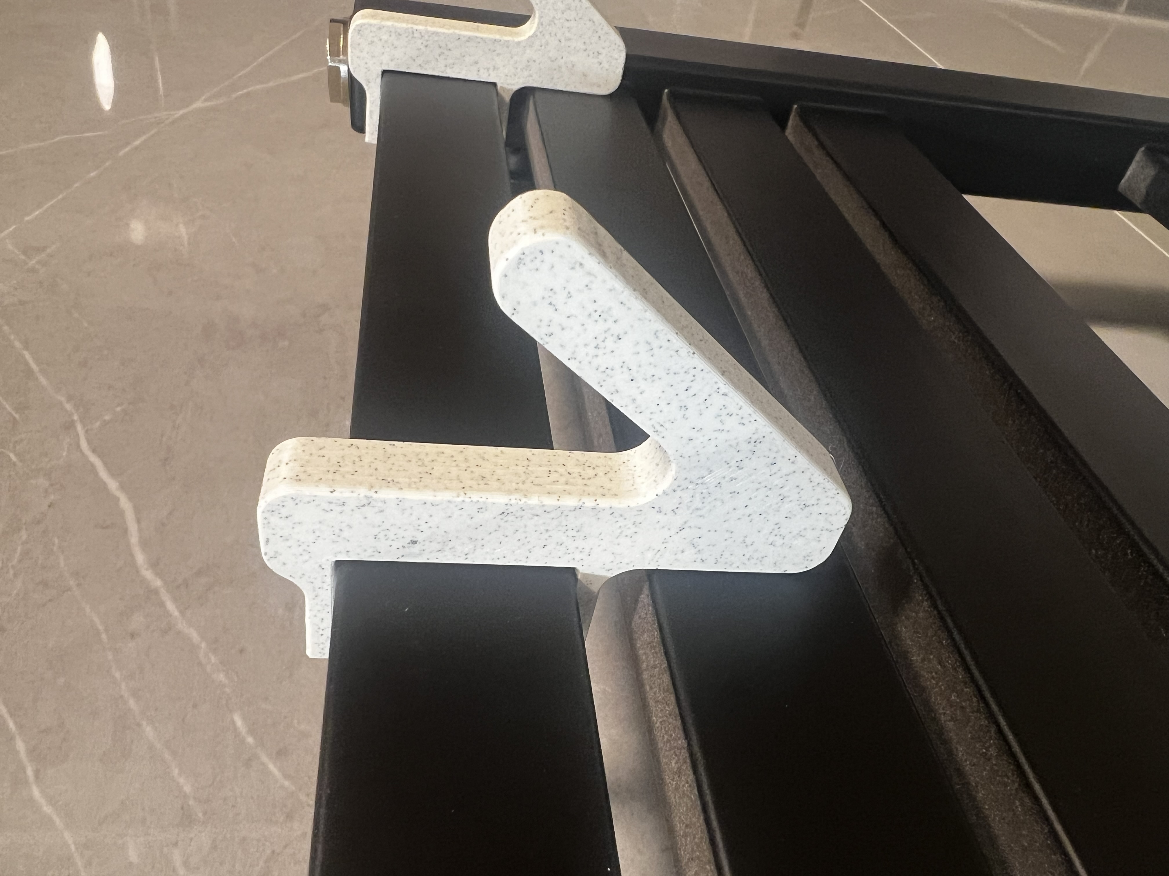 Bathroom towel holder/hook