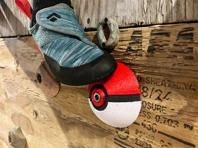 Poke-ball climbing hold
