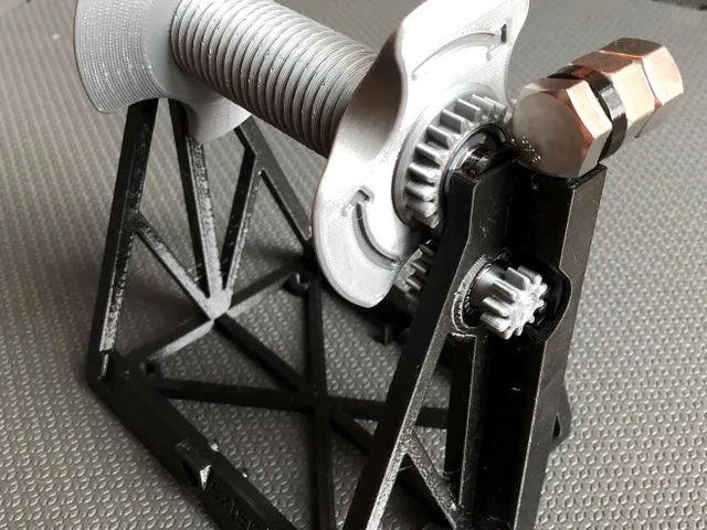 Multiple Mechanism Auto-Rewind Spool Holder