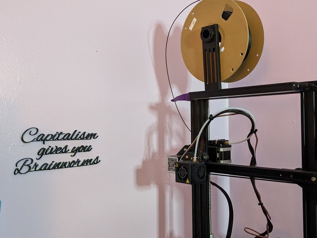 "Capitalism gives you Brainworms" wall art