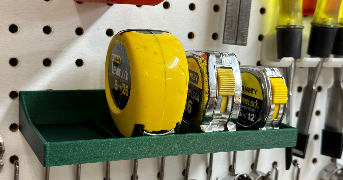 Tape Measure Holder for Pegboard by huberjer Download free STL model