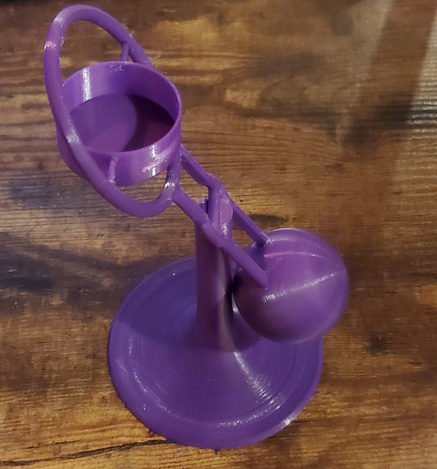 Gimbal stabilized tealight holder