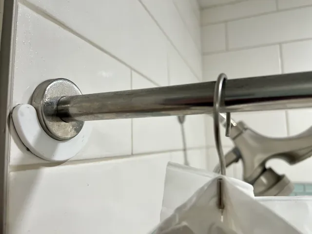 Holder for IKEA AVESJÖN shower curtain tension rod