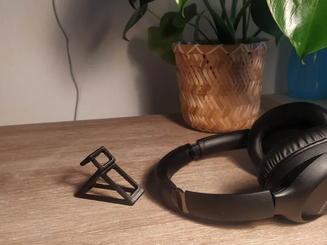 Headphones holder for monitor background