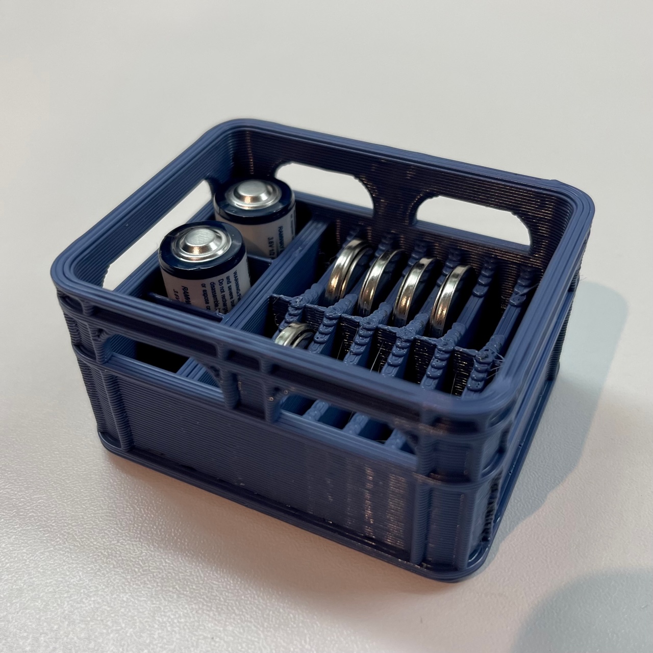 Stackable beer crate for CR2032 and ER14250 batteries