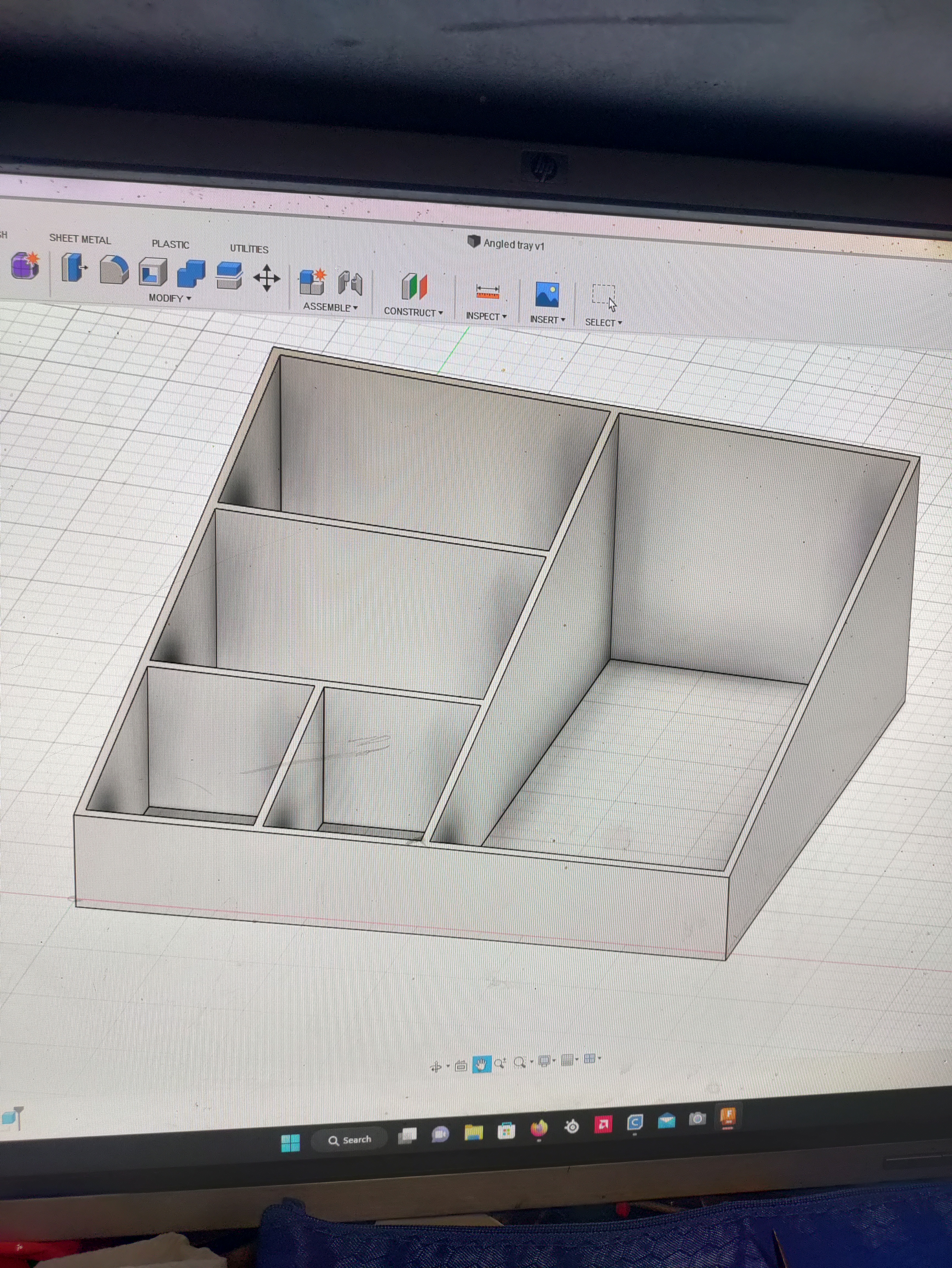 Angled storage tray