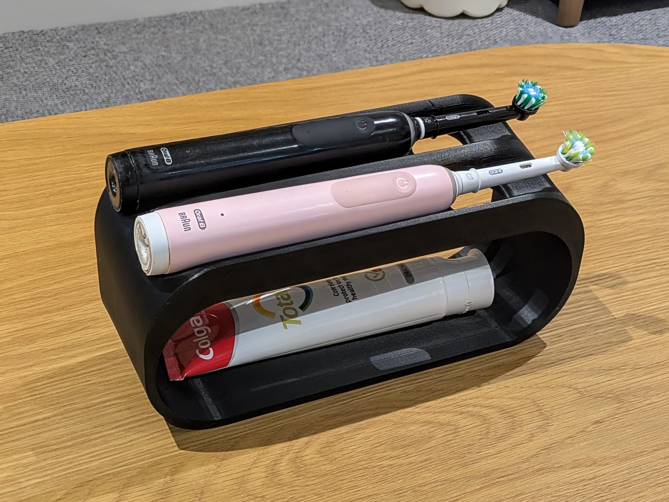 Toothbrush holder for two toothbrushes