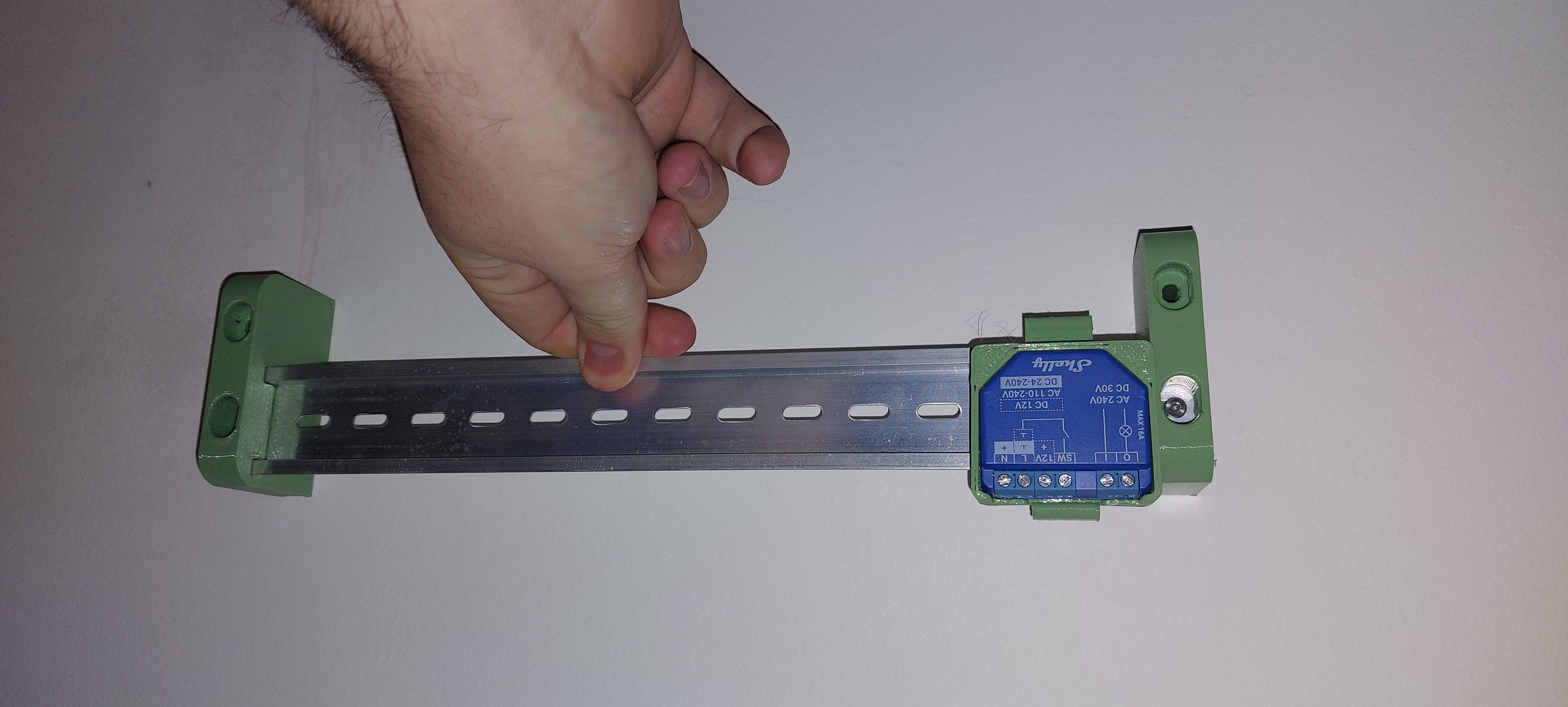 Wall mount DIN rail holder
