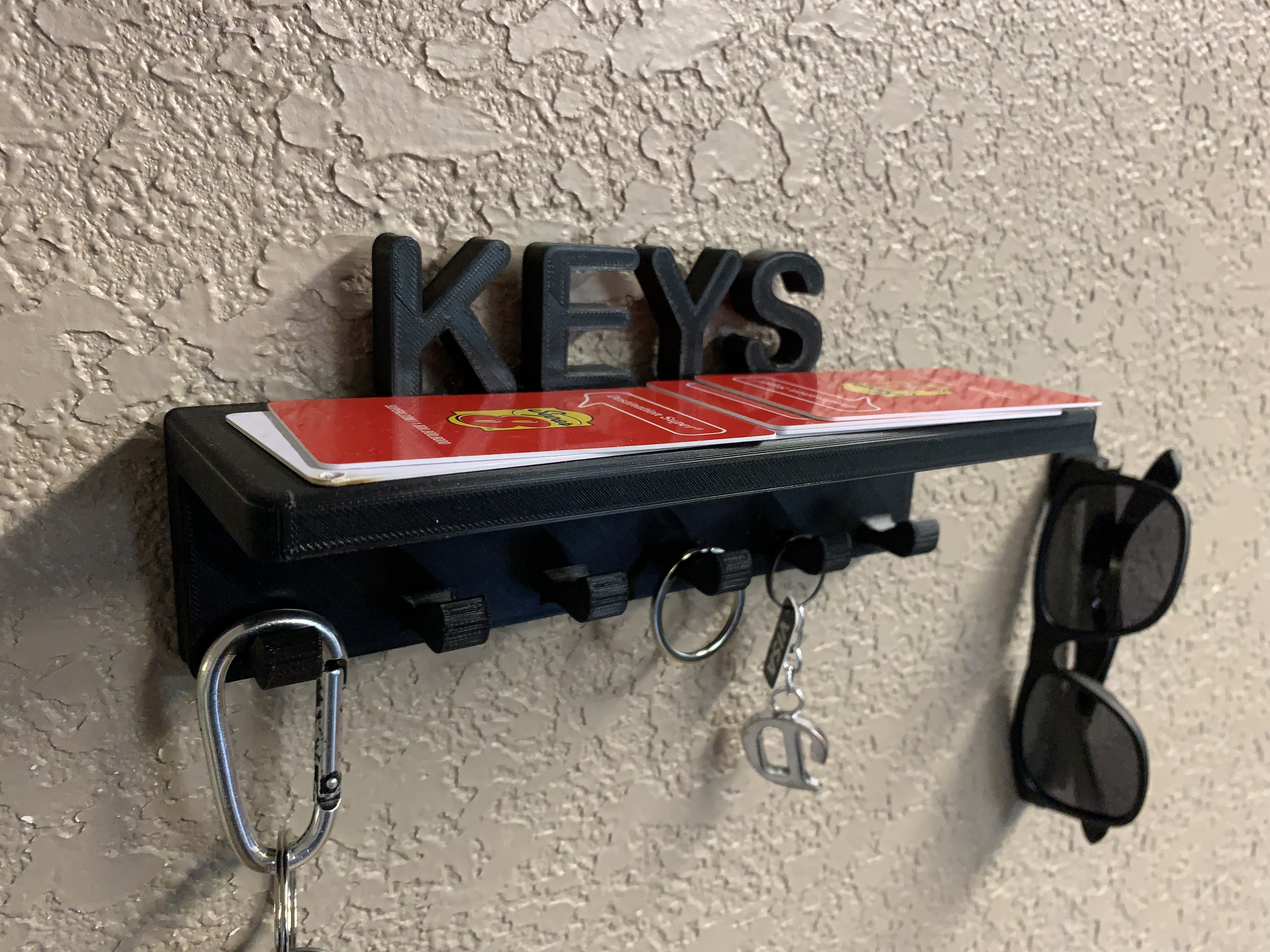 Keys holder & put wallet, etc. on top.