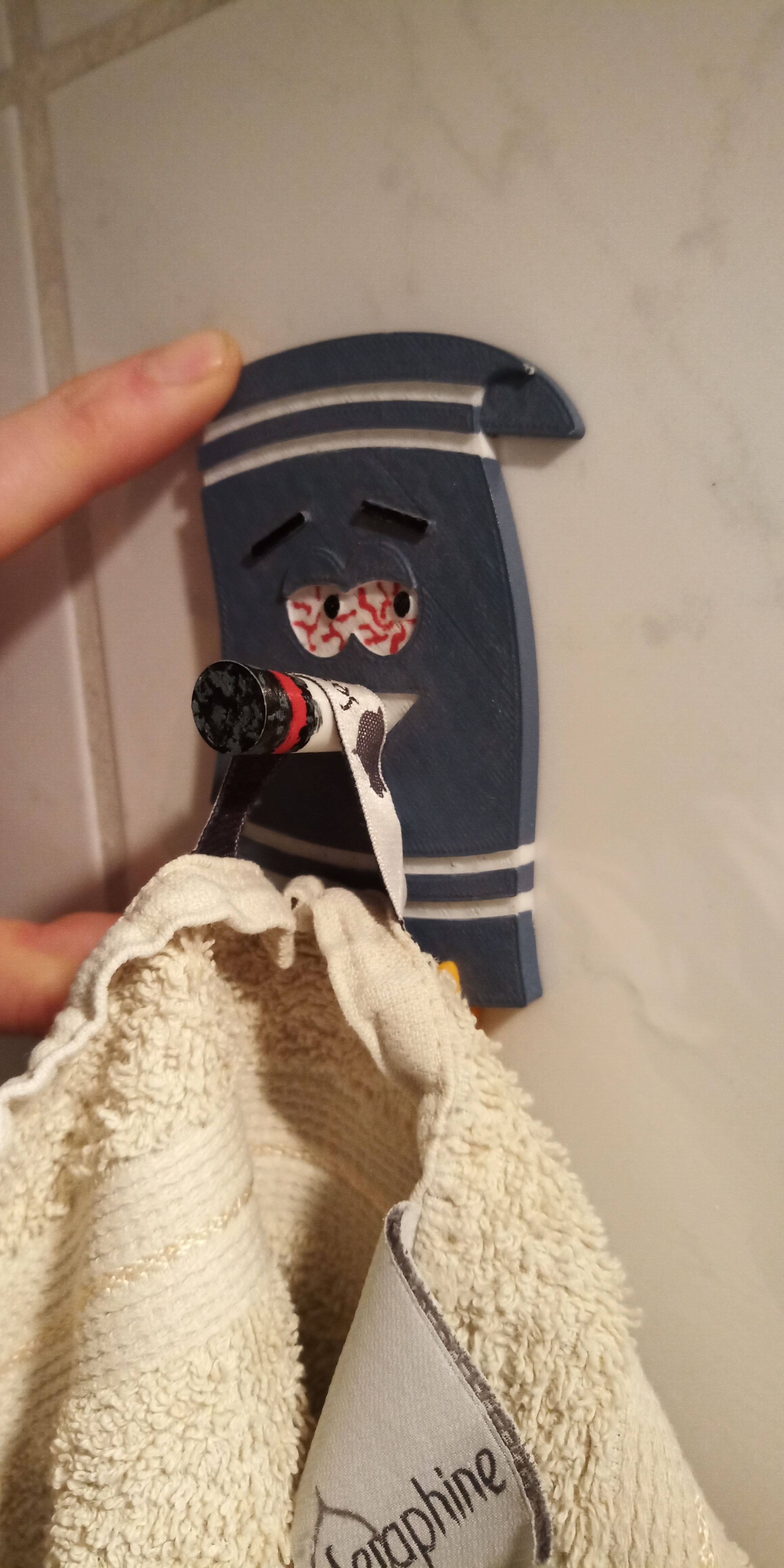 Towelie towel rack