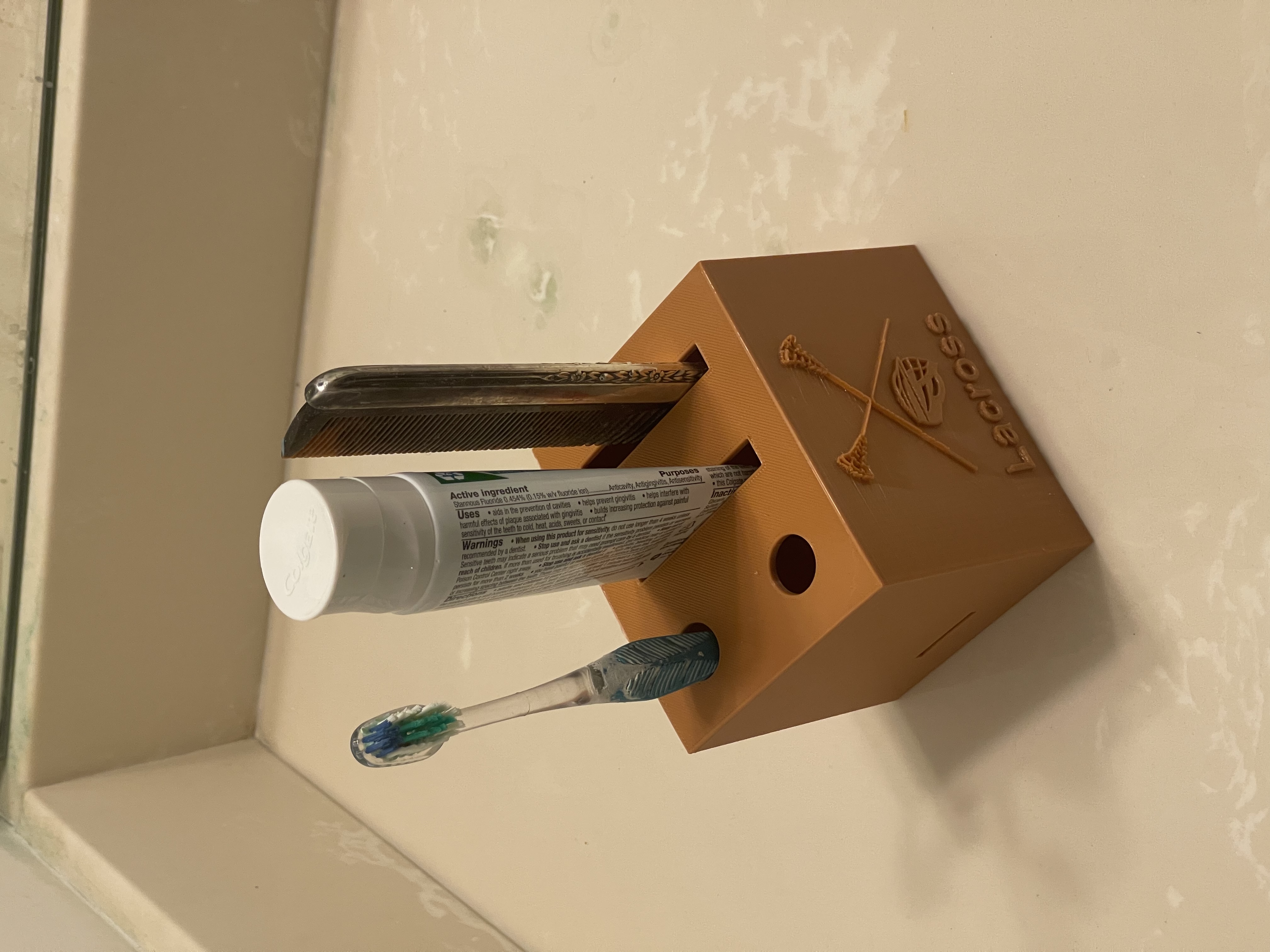 Bathroom sink valet for basic utensils (Toothbrush, Toothpaste, & Comb)-Lacross Logo