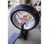 Motorcycle wheel balancer