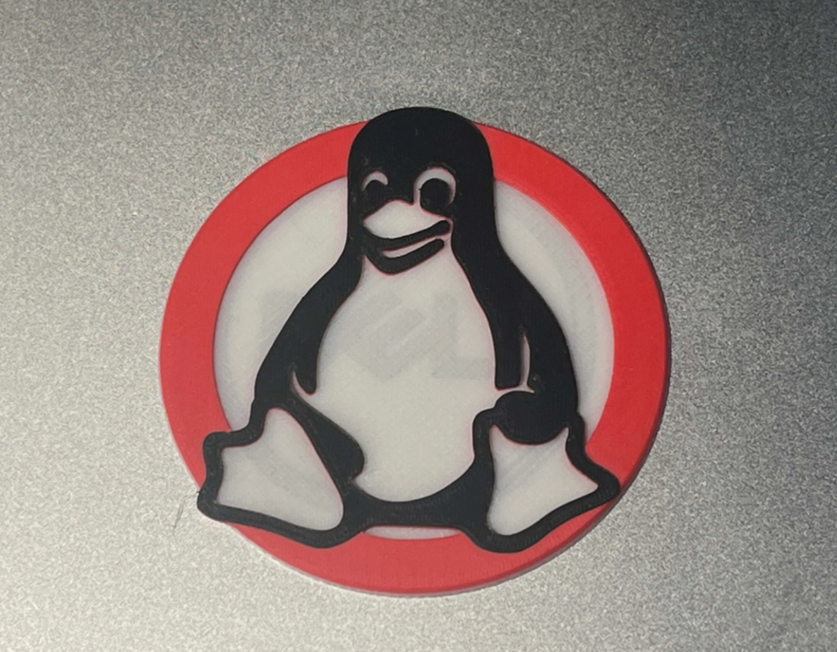 Tux Laptop Badge