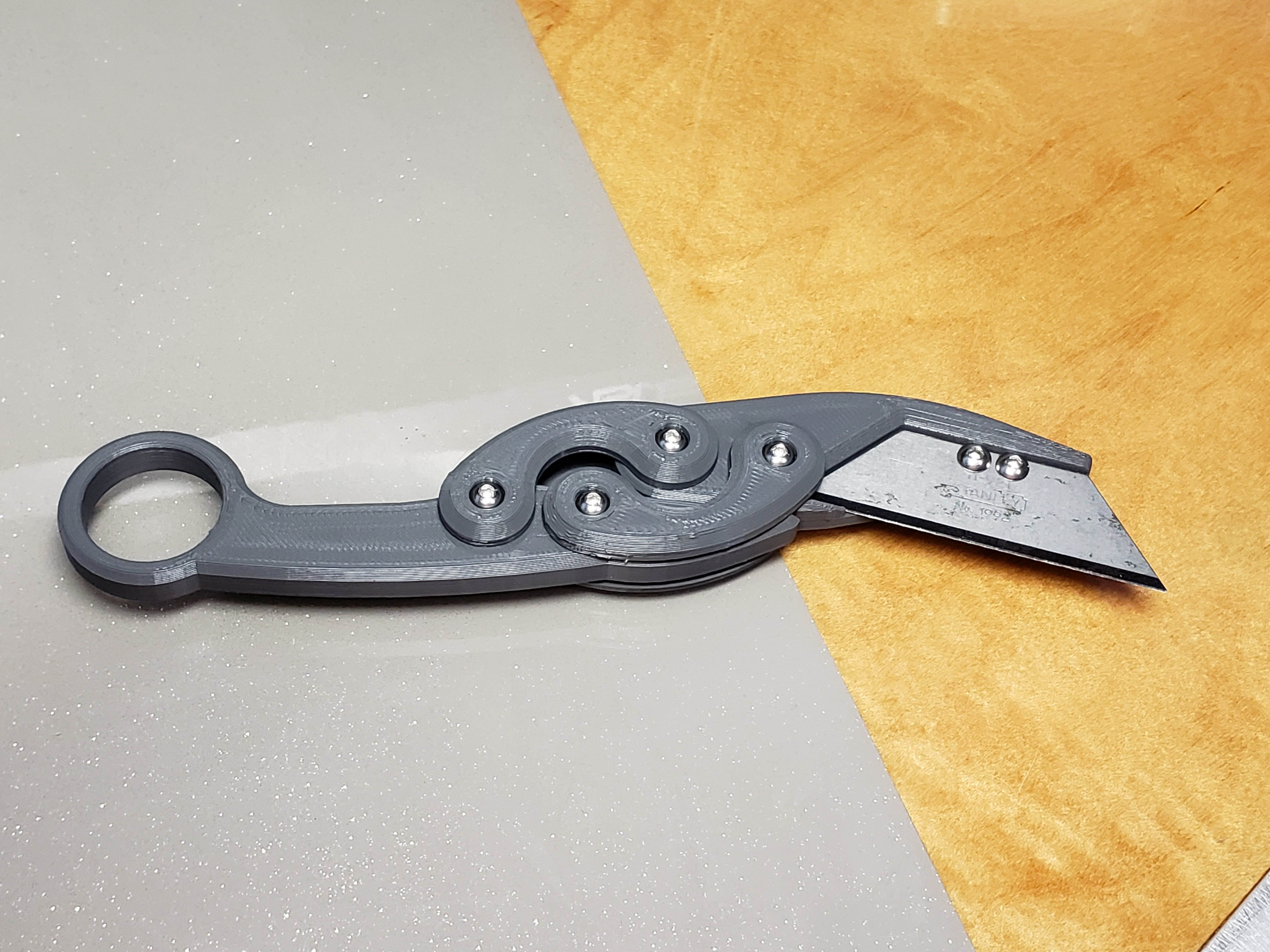 Retracc: The Retractable Karambit Knife [Now With Magnets!!]