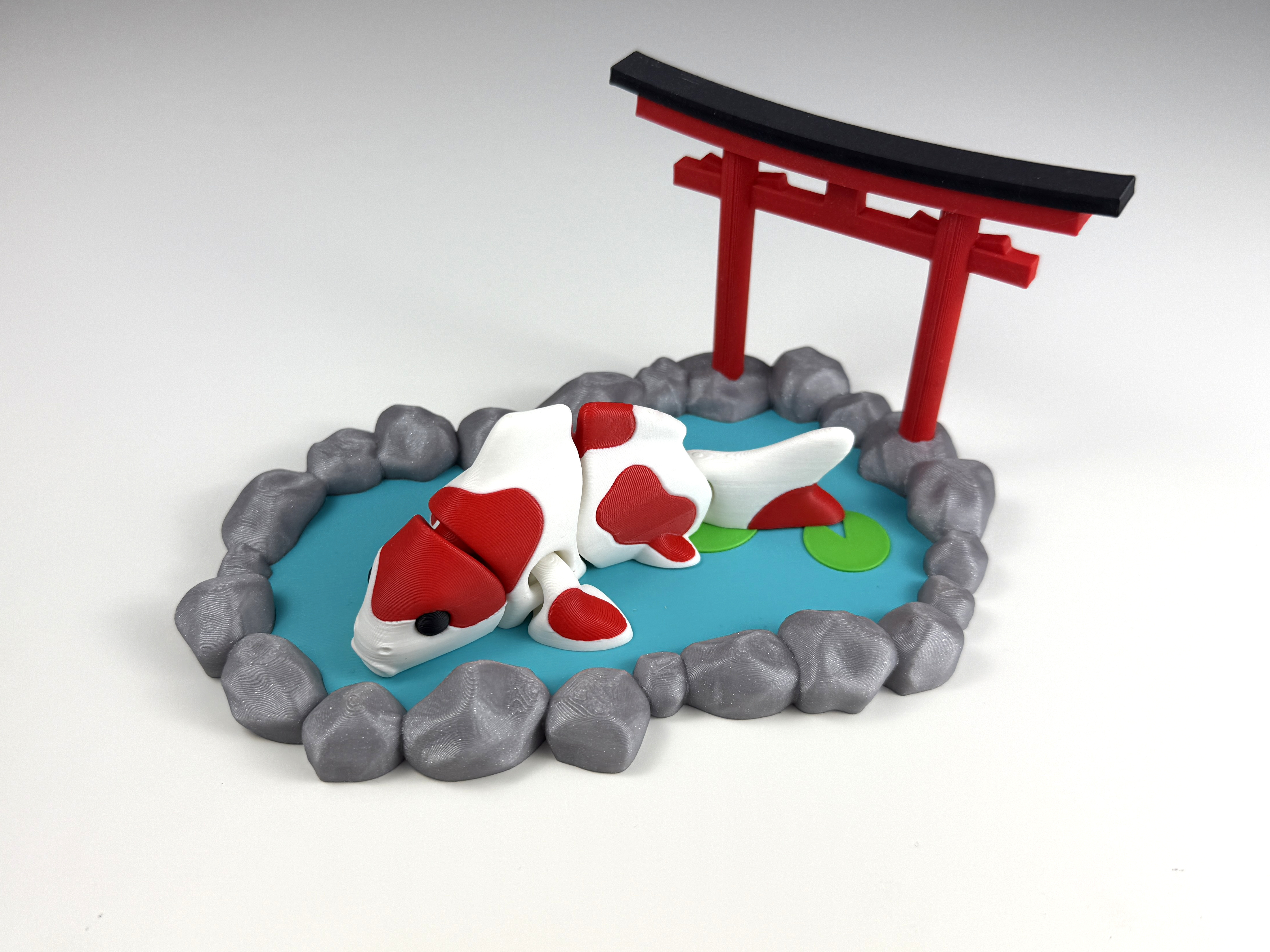 Articulated Koi fish + Koi pond
