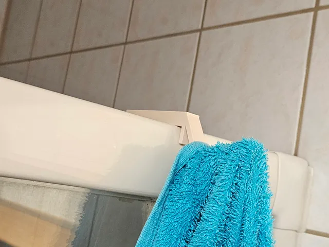 Towel racks for wide shower stalls