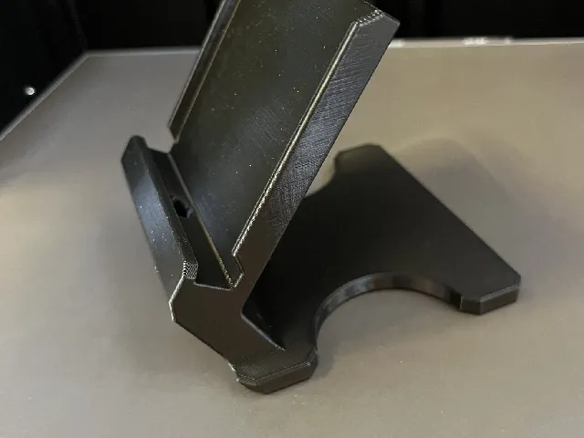 Ultra stable phone stand with charge port