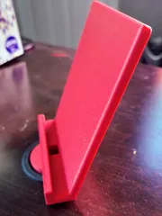 Grommet hole phone or tablet stand
