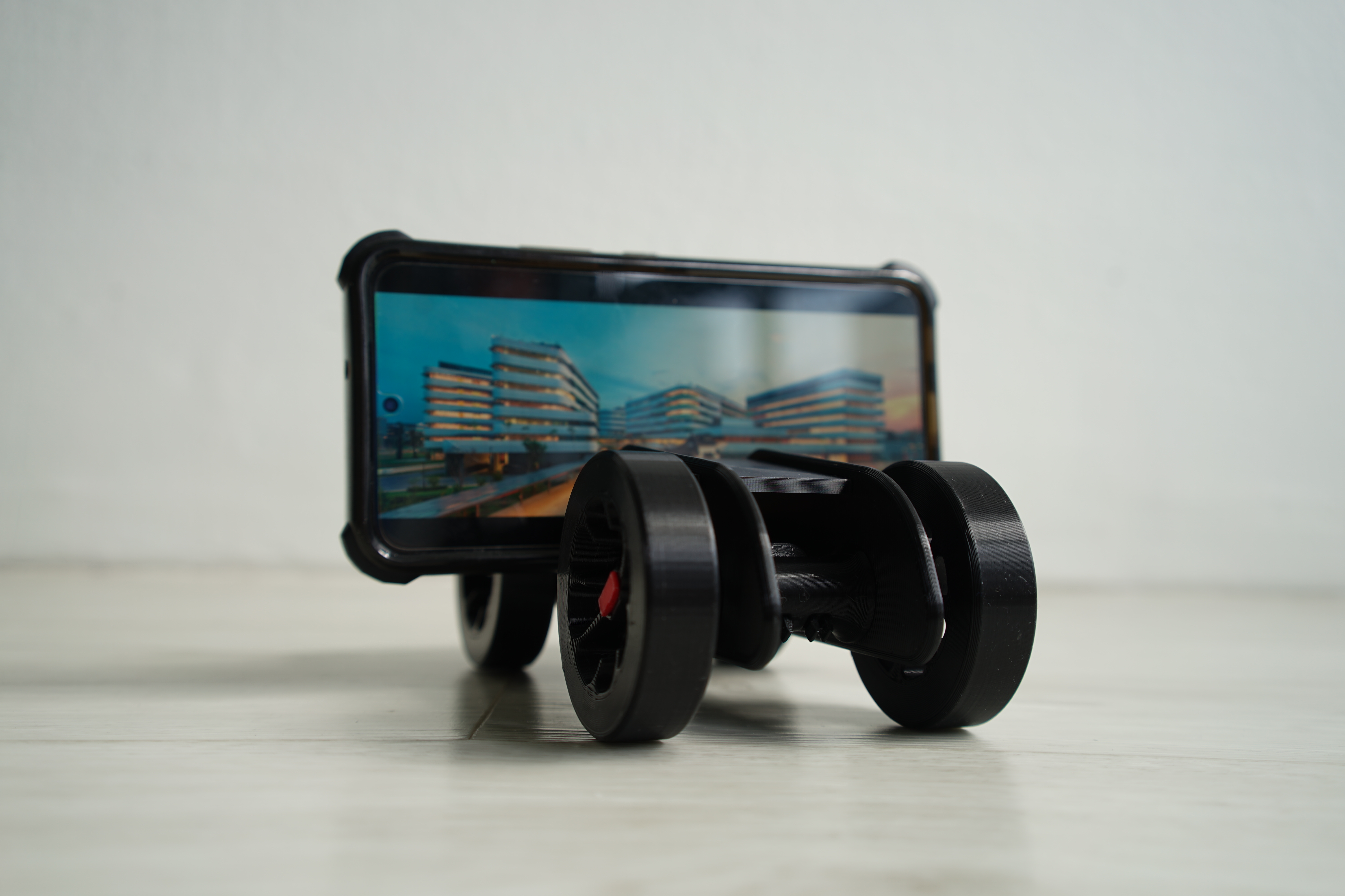 Phone holder with wheels