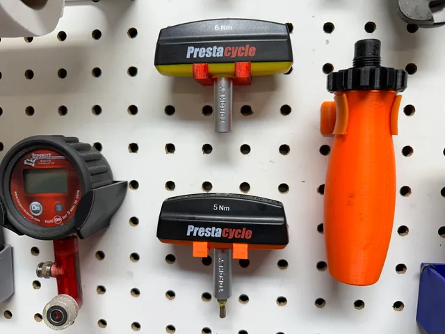 Pegboard holder for Torqkey fixed torque wrench