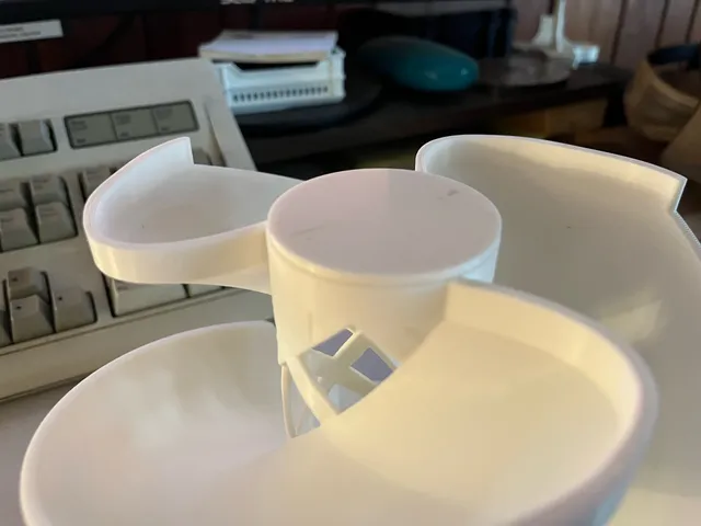 Fridge spiral egg center cap