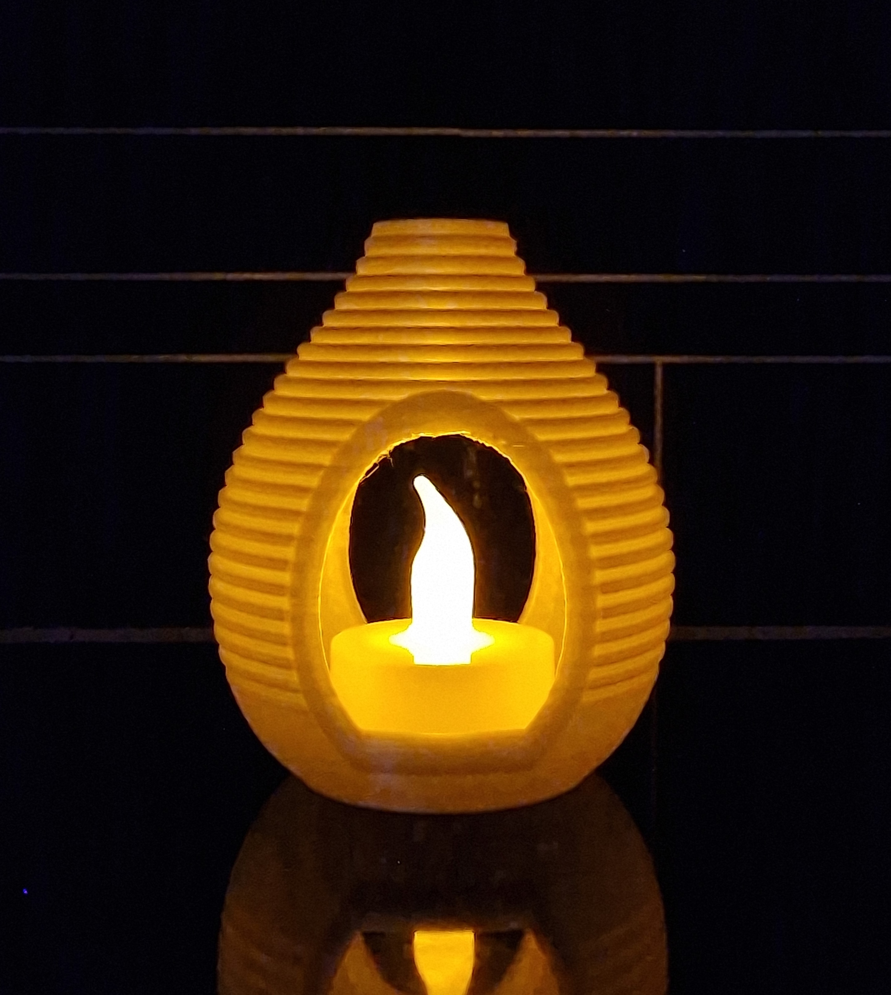 Electric tea light holder