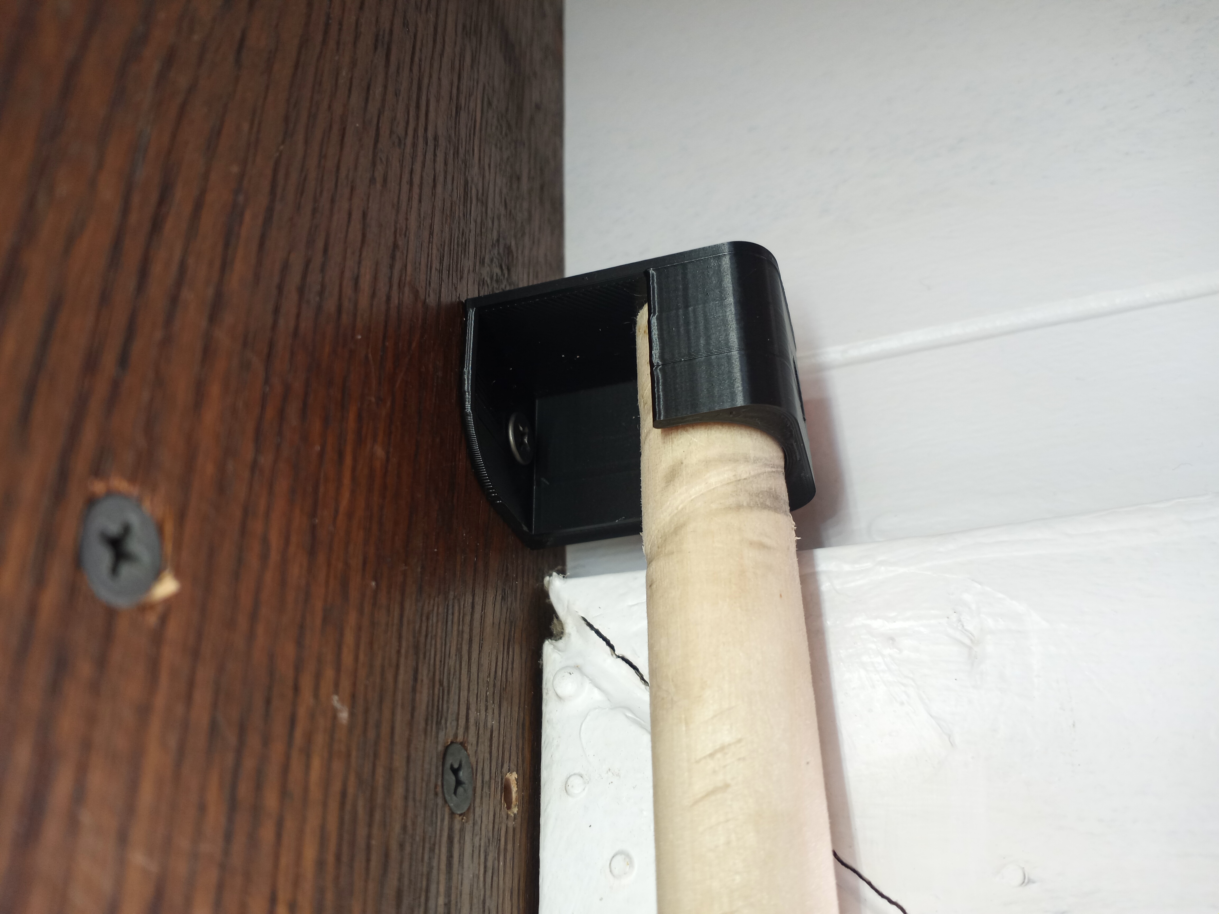 Ceiling mount curtain rod holder