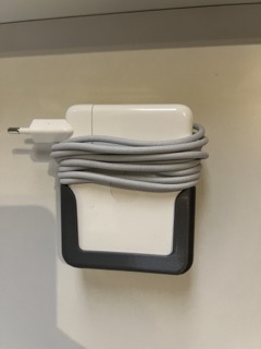 Macbook charger wall mount