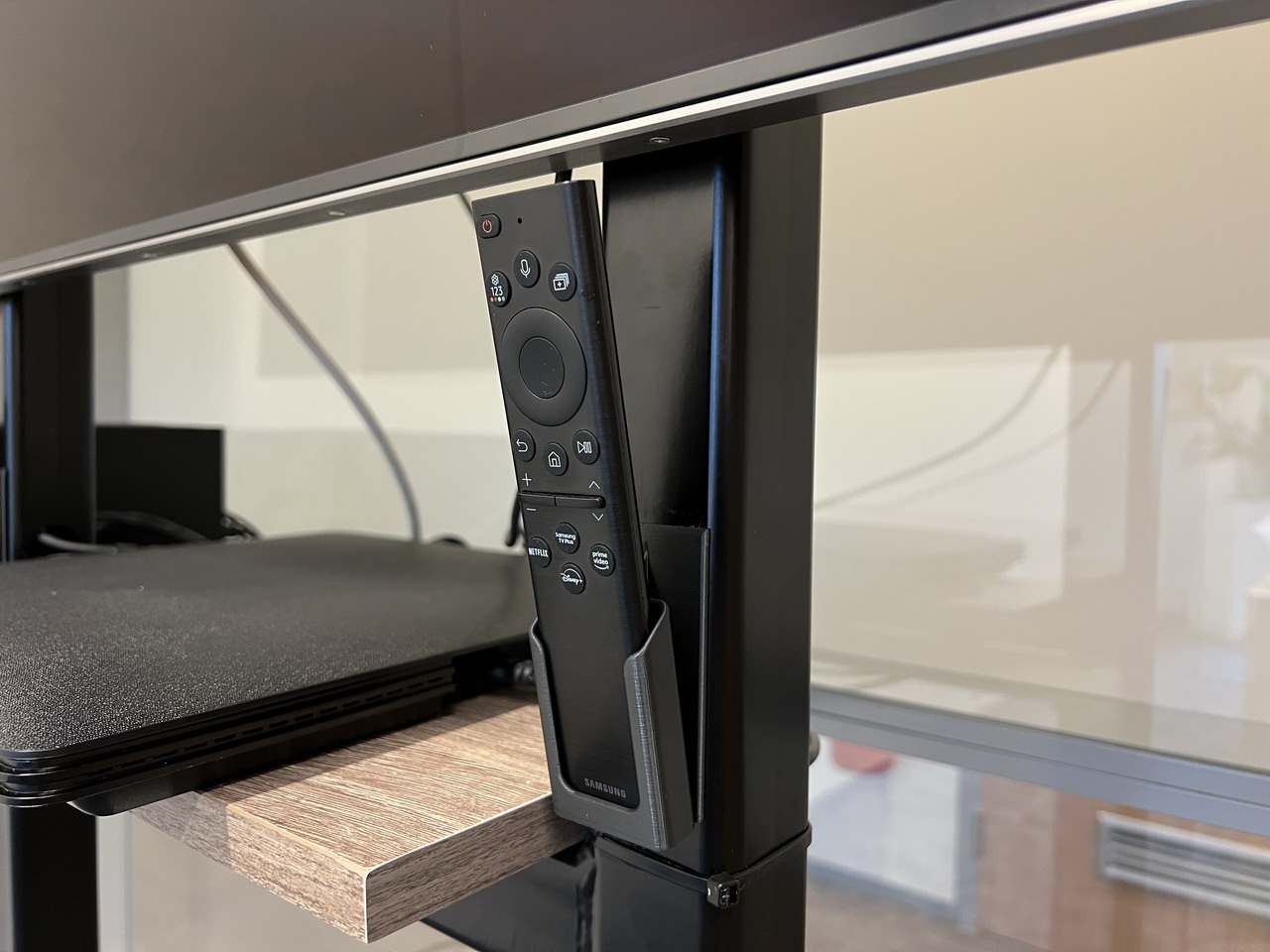 Samsung remote TV holder for on the wall or similar