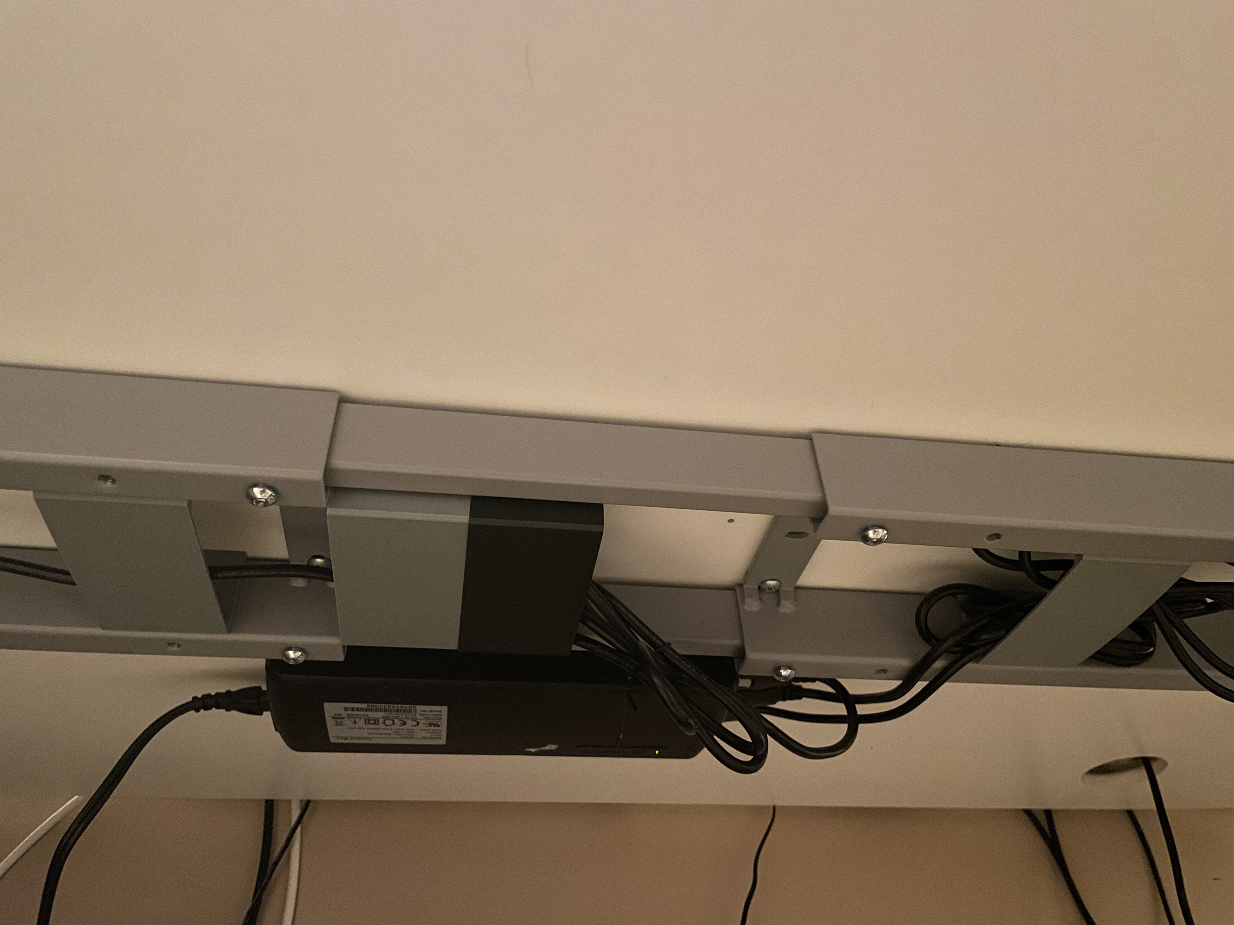 Autonomous desk cable holder