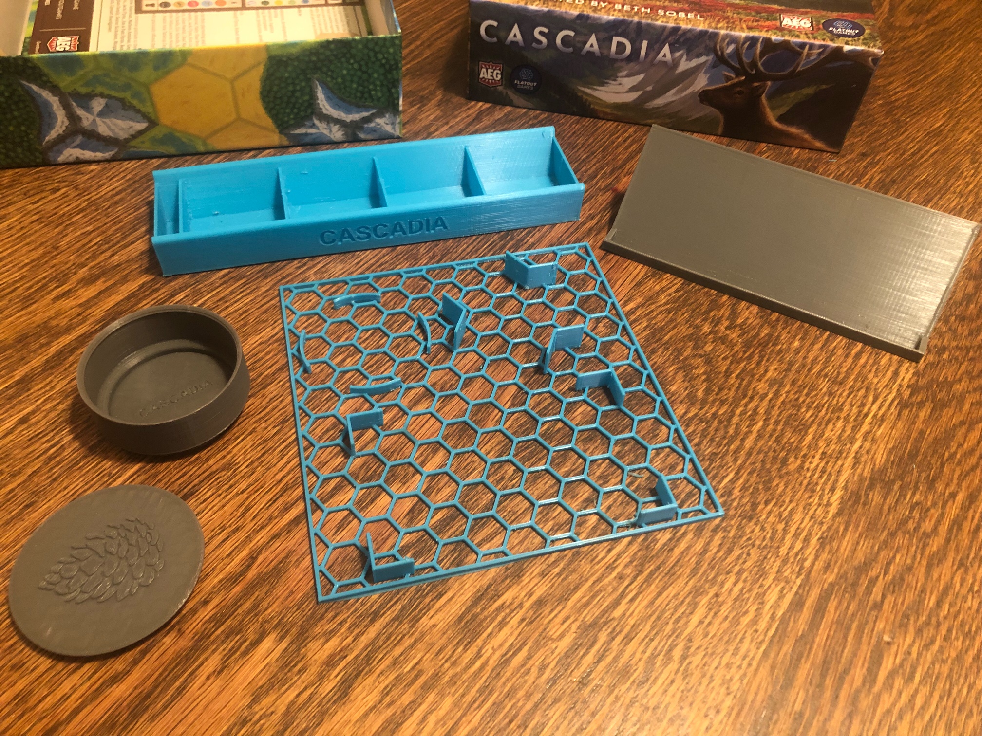 Box inserts for Cascadia board game