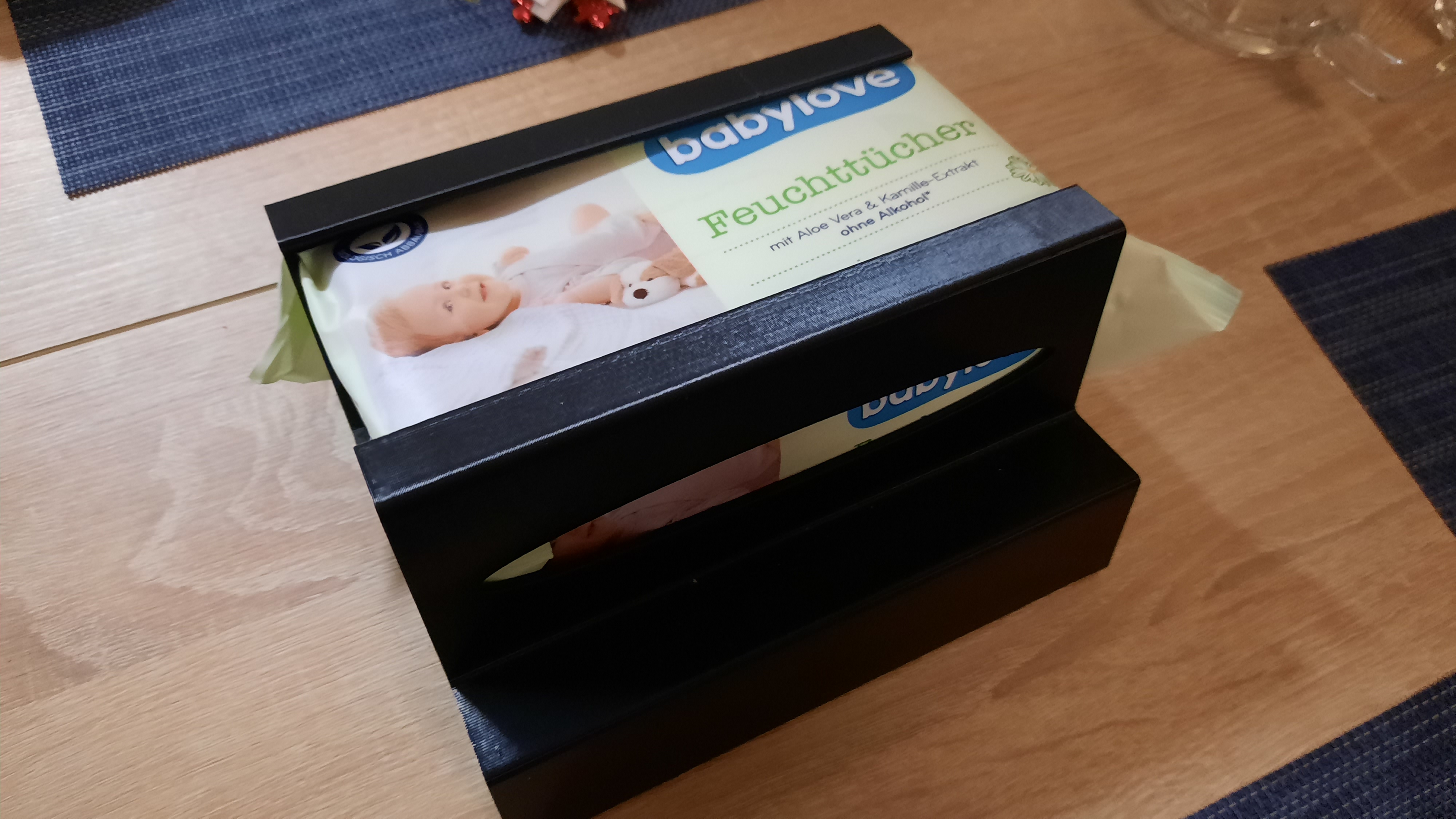 Holder for wet wipes on the changing table