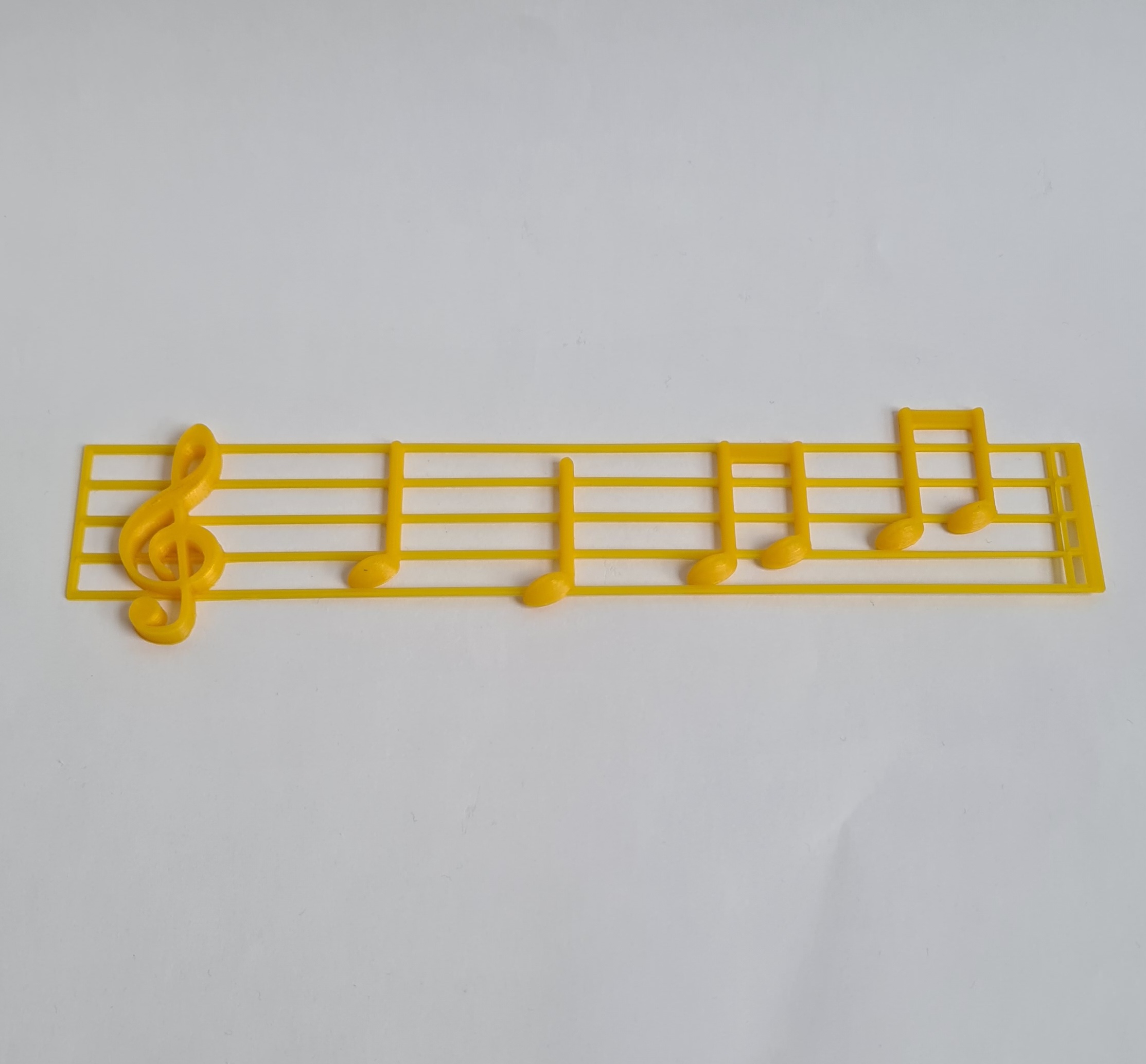 Musical notes and bar with music for VI