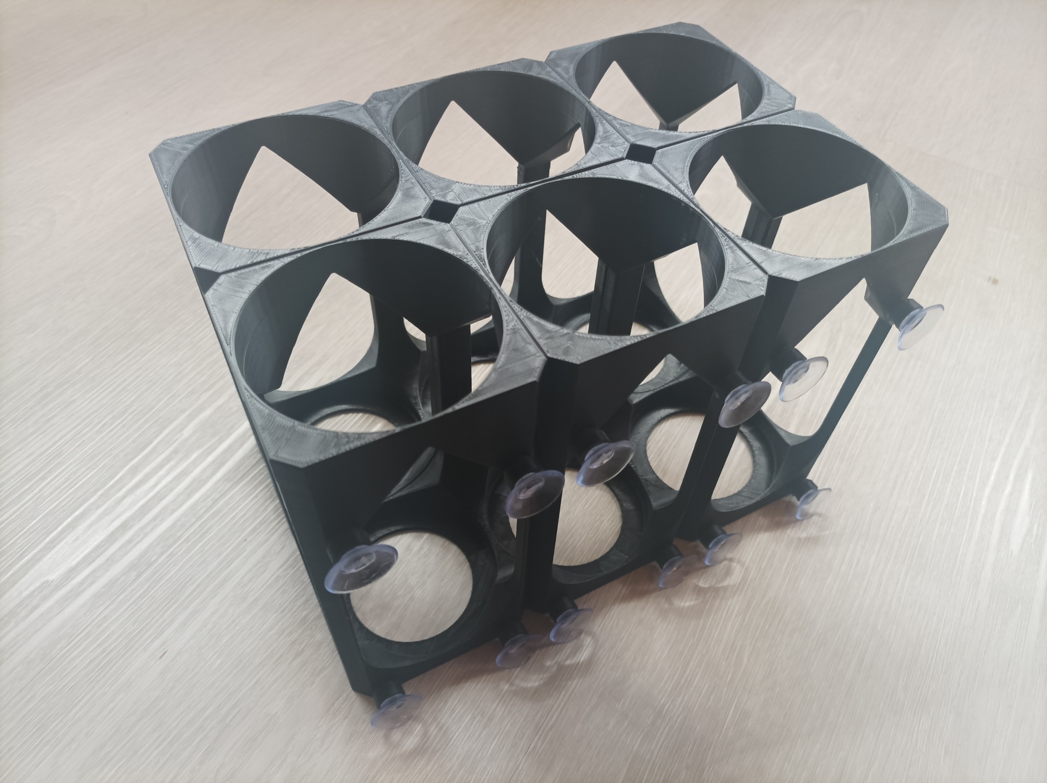 Modular Bottle Holder for Fridges with suction pads by Nivenante