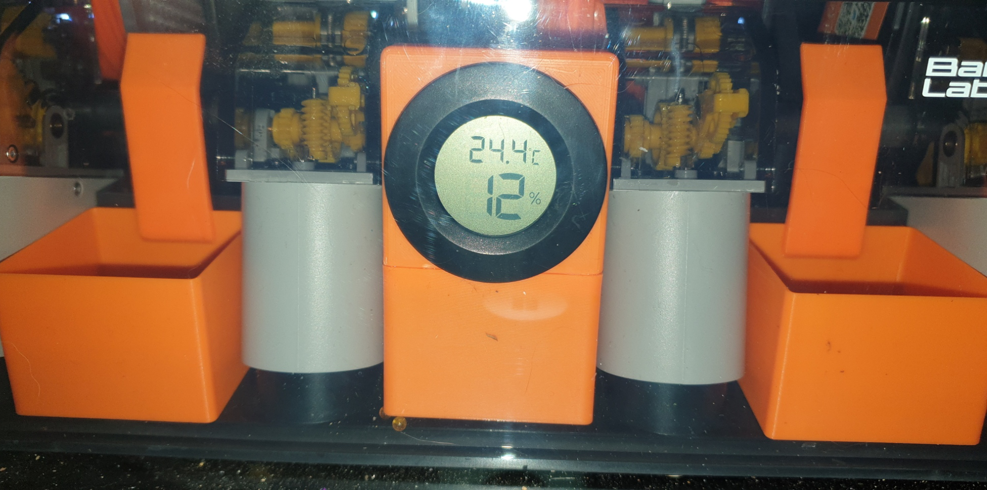 Additional desiccant cases for Bambu Lab X1 AMS (for unpacked silica gel) with humidity sensor support.