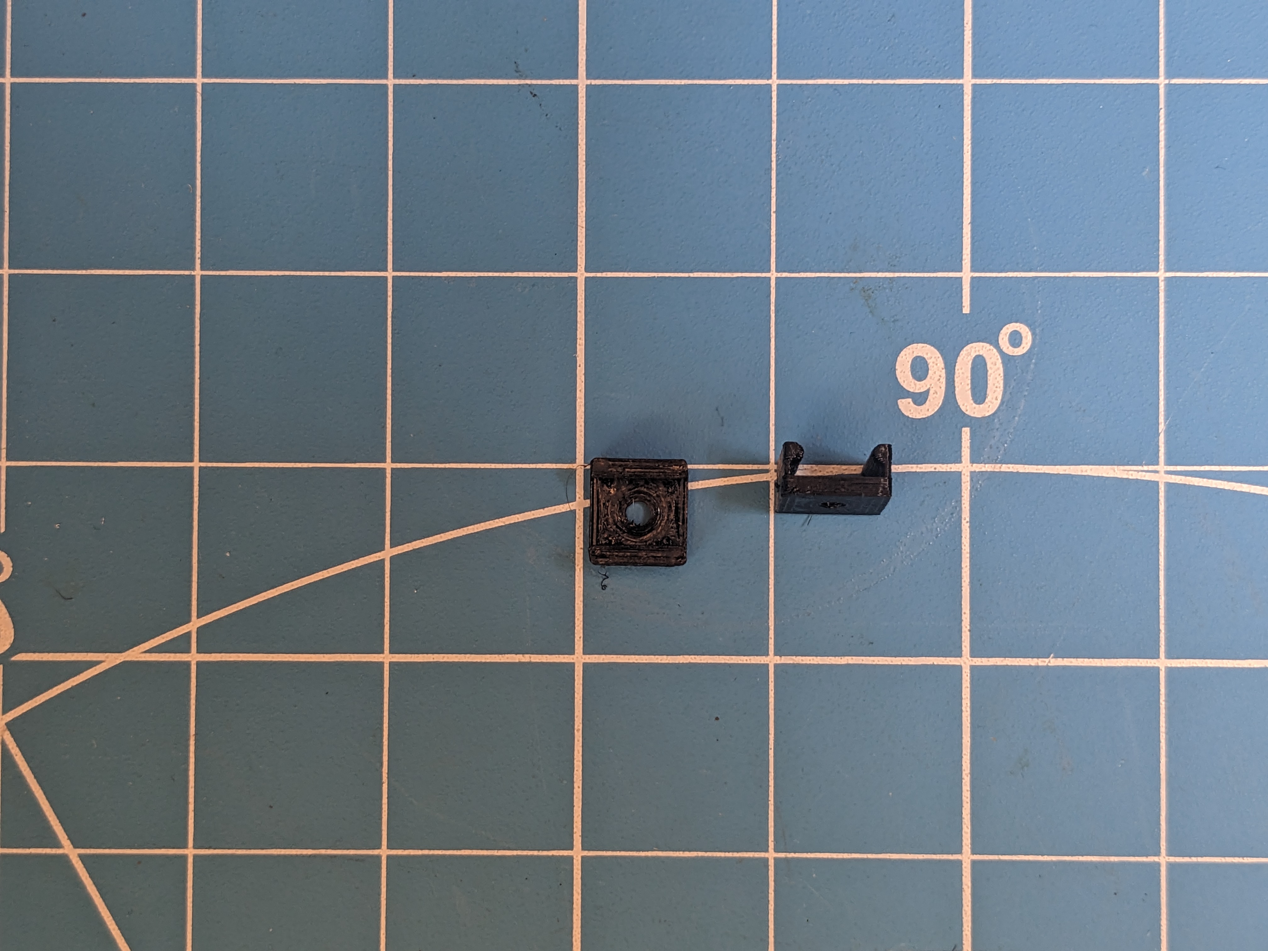 Parameteric flat cable clip with coutersunk screw hole